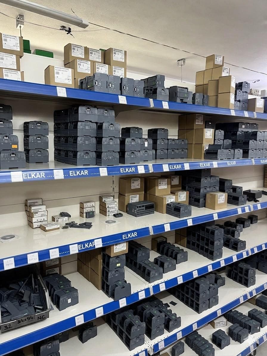 ELKAR warehouse — PLC modules and boxed spare stock
